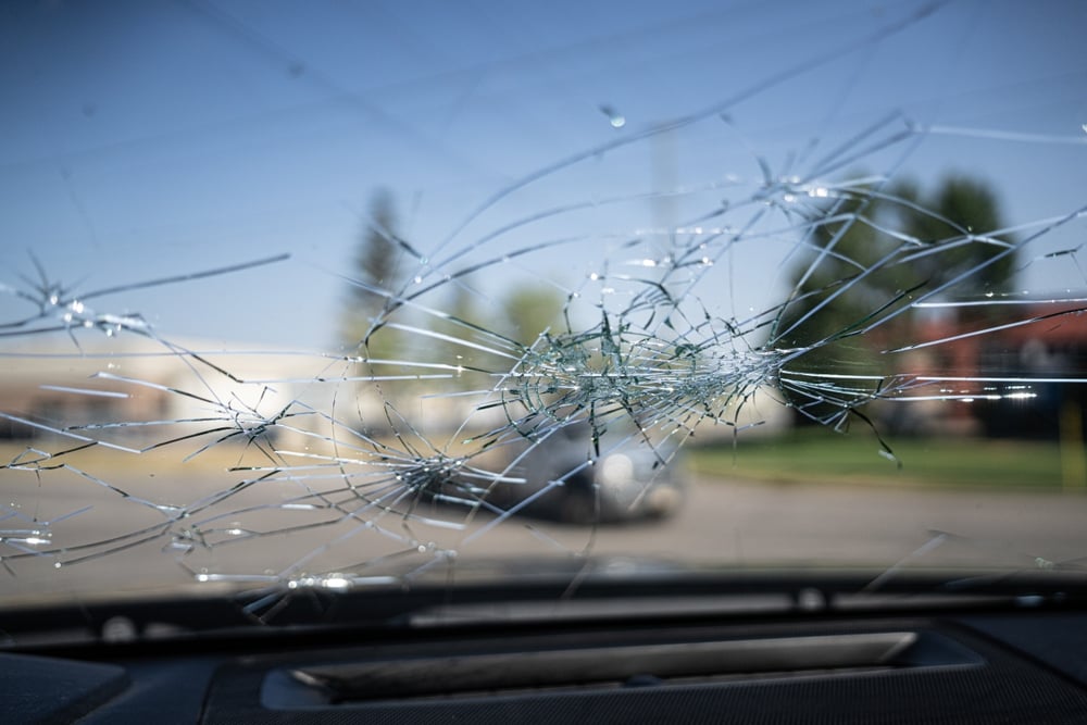 Cracked car windscreen viewed from inside the vehicle at Gosford Windscreens.